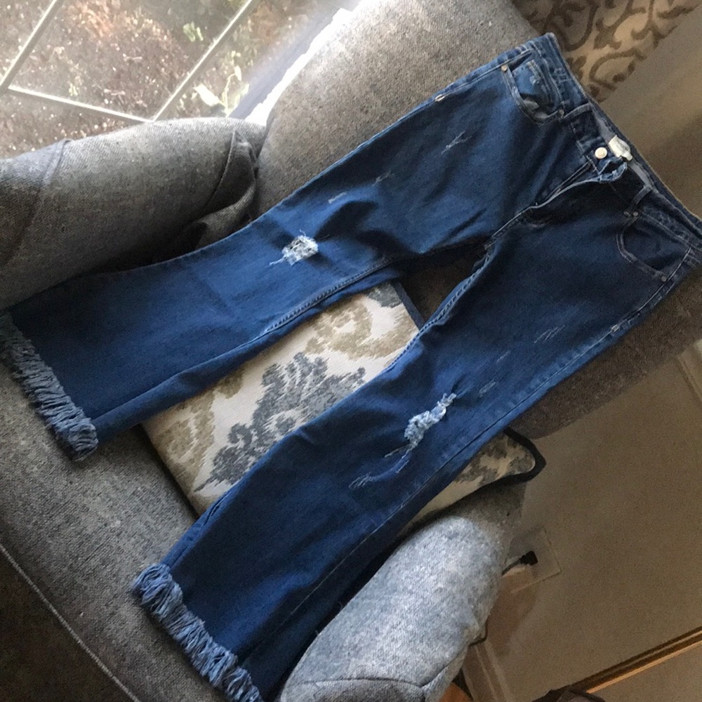 Flare crop jean with fringe hem